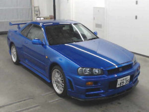1999 Nissan Skyline R34 GTR VSpec Bayside Blue auction front