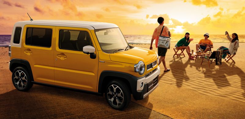 Suzuki Hustler hybrid yellow beach